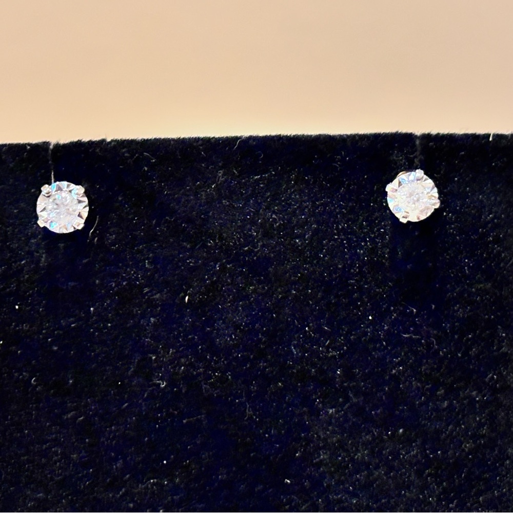 Elegant 14k .56 each diamond Stud Earrings.  So beautiful, great value
